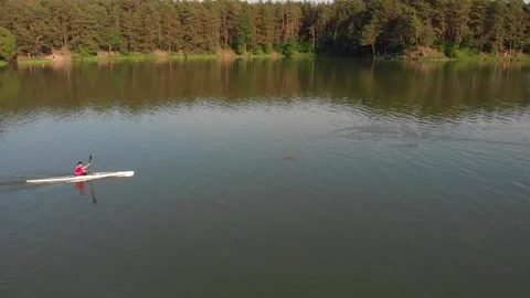 A man is kayaking on the river Stock Footage 132830544