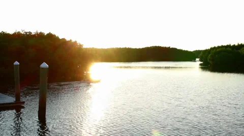 Man kayaking at sunrise Stock Footage 32186369