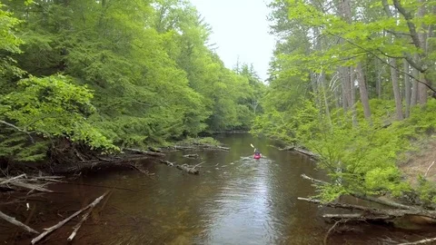 Man Kayaks in River Stream Stock Footage 75797659