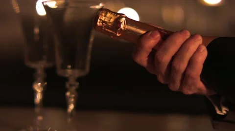 Man keeps a bottle of champagne. Stock Footage 42820119