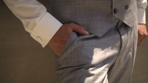 A man keeps his hands in his pocket Stock Footage 168009628