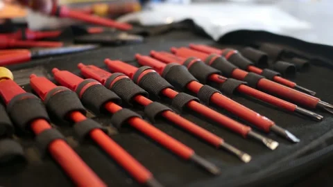 A man keeps a screwdriver in the pocket after used 스톡 동영상 149592178