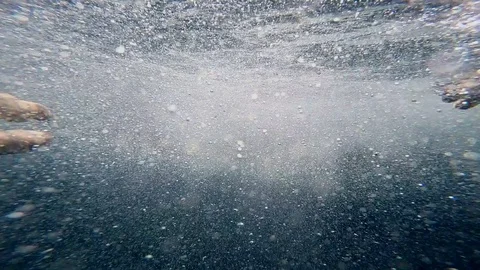 Man keeps underwater next to another man Video stock 102020440
