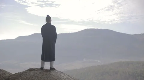 Man in Kimono looking at Landscape Scenery from Cliff 4K Stock Footage