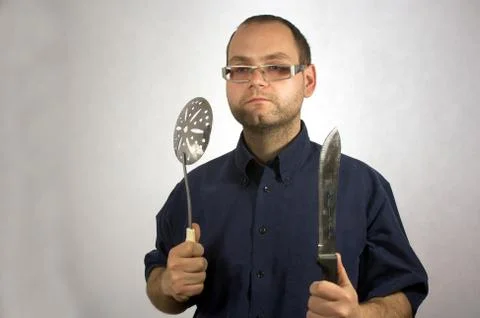 Man with kitchen accessories on white 스톡 사진