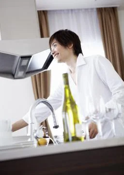 Man in kitchen Stock Photos