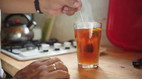 Man in the kitchen preparing tea Stock Footage 66826185