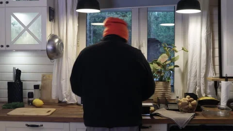 Man in the kitchen washing dishes Stock Footage 274433535