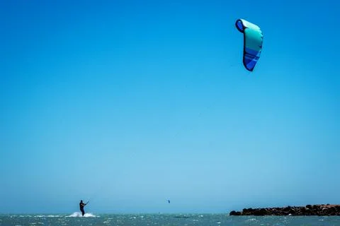 Man on kite Stock Photos