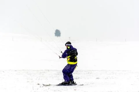 Man kite skiing Stock Photos