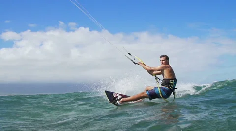 Man Kite Surfing In Ocean on Summer Day Doing Extreme Trick Stock Footage