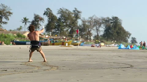 Man kiting at sandy beach in Goa. Stock Footage 49662776