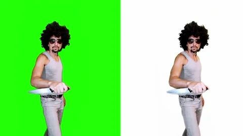 Man with a knife on a green background Stock Footage 299980661