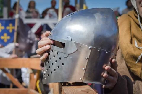 The man on the Knight Tournament holdind a knights helmet Stock Photos
