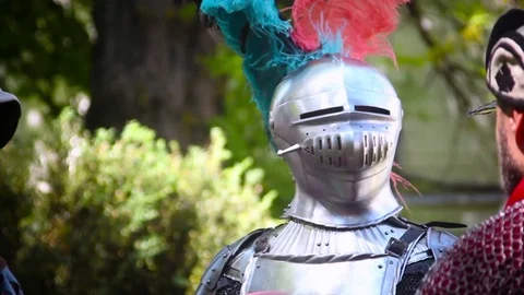 A man in a knightly helmet Stock Footage 72334426
