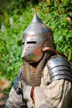 Man in knight's helmet Stock Photos