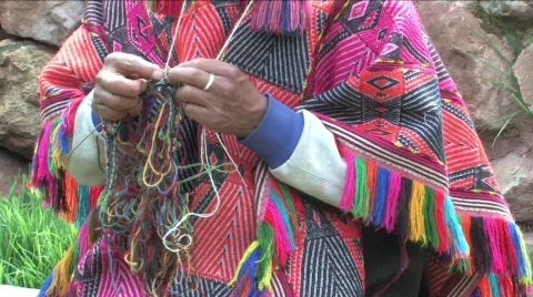 Man knitting an Alpaca hat in Peru Stock Footage 294032