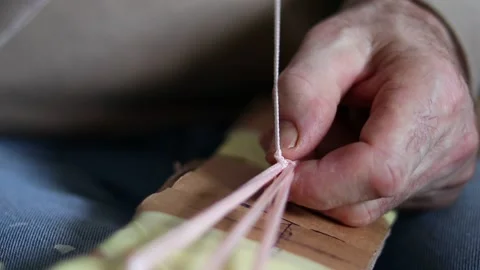 Man is knitting a bag. Handmade bag creation process. Stock-Footage 233161982