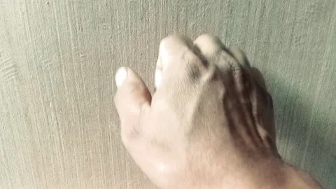 A man is knocking on the door  Stock Footage 320671959
