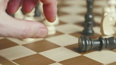 Man knocking down the king with his finger Stock-Footage 233928103
