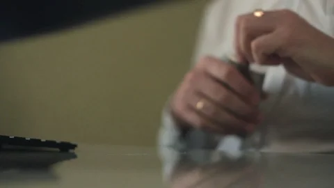 Man knocks his hands on the table, drinks alcohol, stress Stock-Footage 86173677