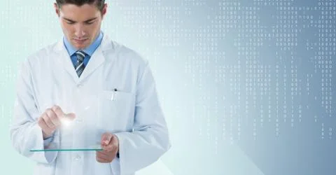 Man in lab coat looking down at glass device with flare against blue background 스톡 사진