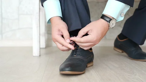 Man lace boot tracking camera Video stock 62678338