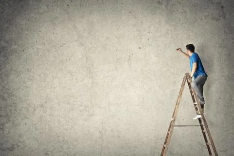 Man on ladder Stock Photos
