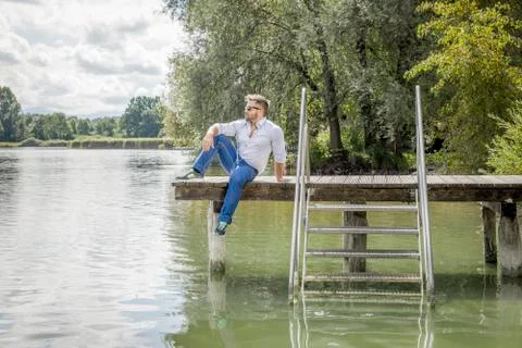 Man at the lake Stock Photos