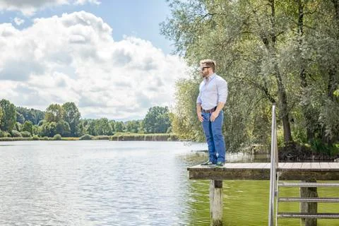 Man at the lake Stock Photos
