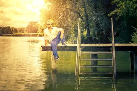 Man at the lake Stock Photos