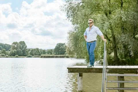 Man at the lake Stock Photos
