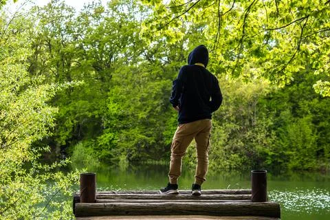 Man by the lake Stock Photos