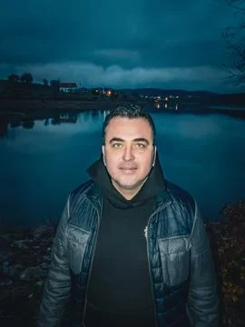 A man by the lake Stock Photos