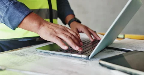 Man, laptop and contractor hands on construction site, design layout and email Stock Footage 283699003