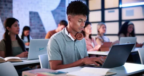 Man, laptop and typing in classroom at university for notes, review and Stock Footage 336302036