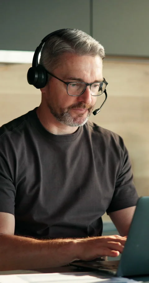 Man, laptop and virtual assistant in home with remote work, discussion and admin Stock Footage 337154695
