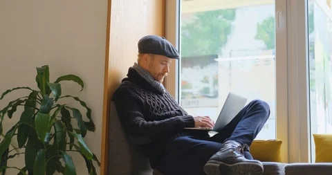 Man with laptop indoors Stock Footage 122339811