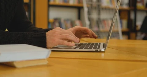 Man with laptop indoors Stock Footage 122339906