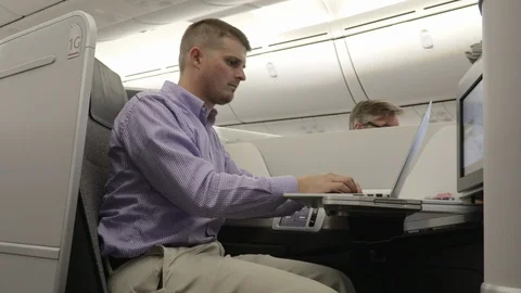 Man on Laptop Plane 4K Stock-Footage 89291784