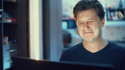 Man with laptop, problems at work, bad news Stock Footage 84567405