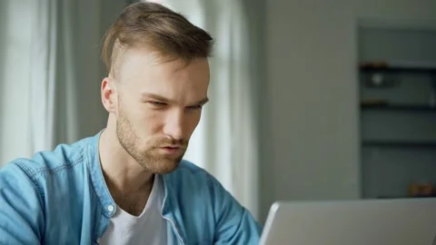 Man with laptop solving problem Stock Footage 131769336