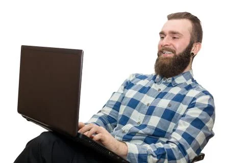 Man with a laptop on a white background Stock Photos