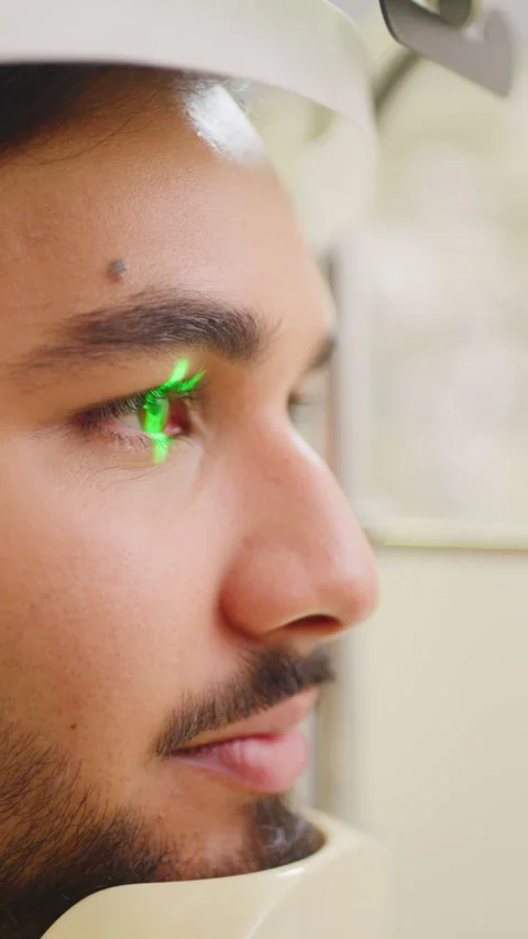 Man, laser and eye exam with scanner for vision test, sight or healthcare in Stock Footage 327293507