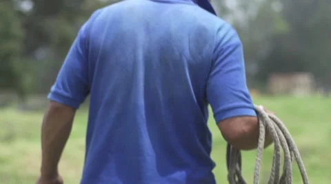 Man with a lasso Stockbeeldmateriaal 65385079