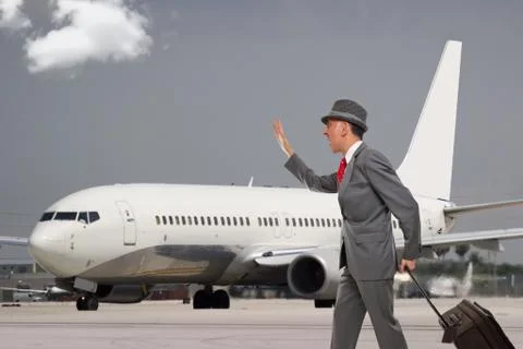 Man late for his flight Stock Photos