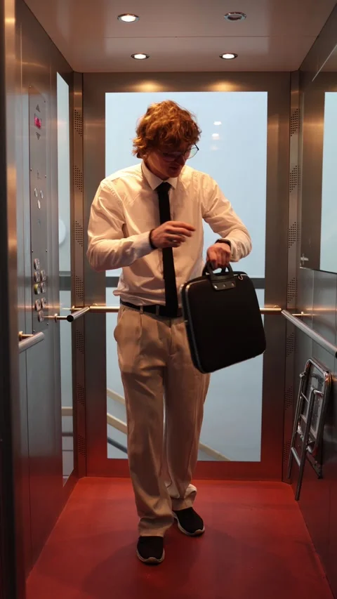 Man late for work checks time Stock Footage 333511661