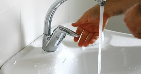 Man lather his hands to avoid virus infection Stock Footage 126890856