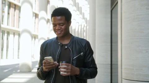 Man laughing at text message Stock Footage 91516783