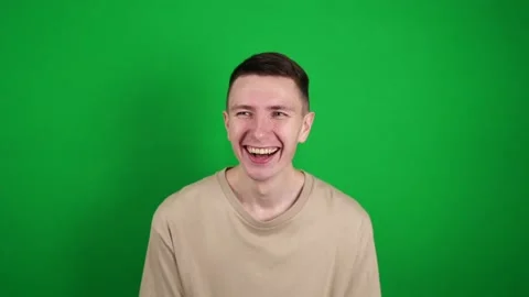 A man laughs against the background of chromakey Stock Footage 170676348